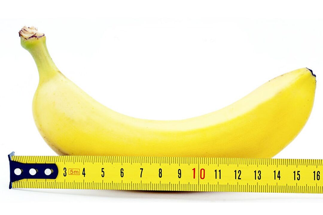 Eine Banane mit einem Lineal symbolisiert die Größe des Penis nach der Operation